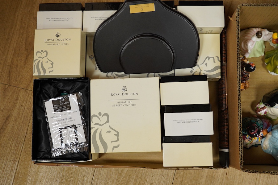 A collection of Royal Doulton figures Beatrix Potter character figures and boxed miniature figures. (2)